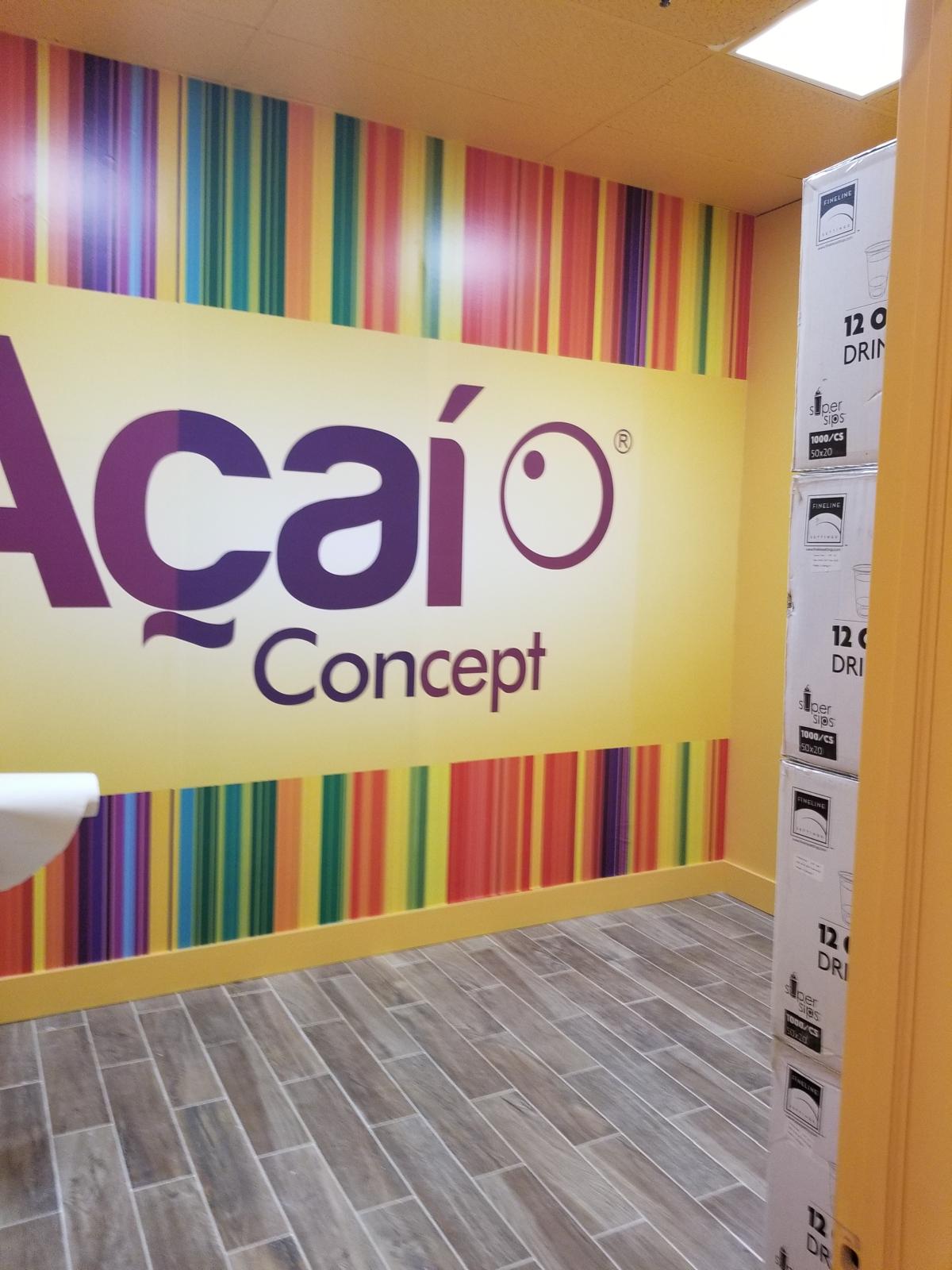 Large branded feature wall graphic installed in a finished retail space